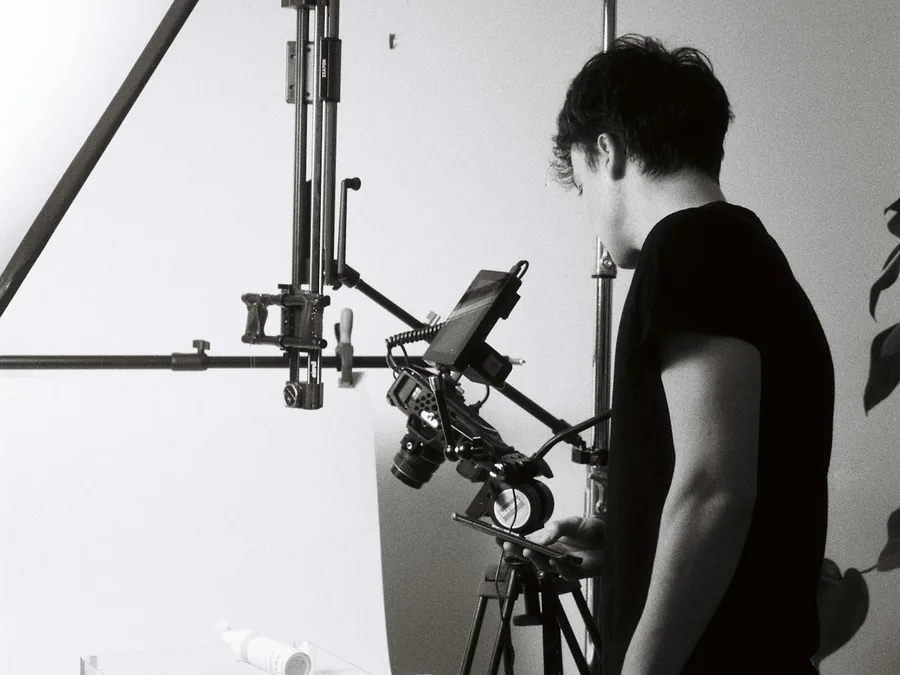 Studio lighting being set up for a product shoot