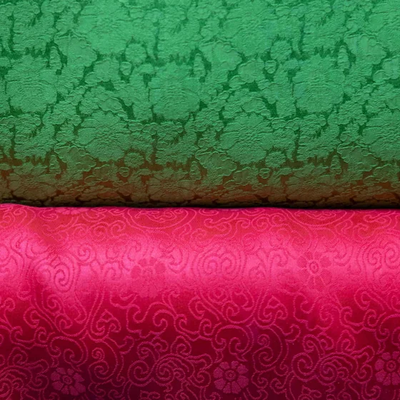 Two woven swatches in different colourways and motifs